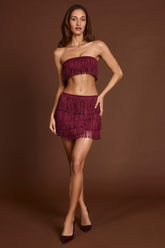 Fringed Mid-Rise Mini Skirt in Wine Red