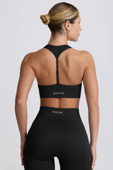 Super Sculpt Seamless T-Back Sports Bra in Black