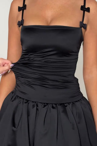 Bow-Detail Ruched Bubble Hem Mini Dress in Black