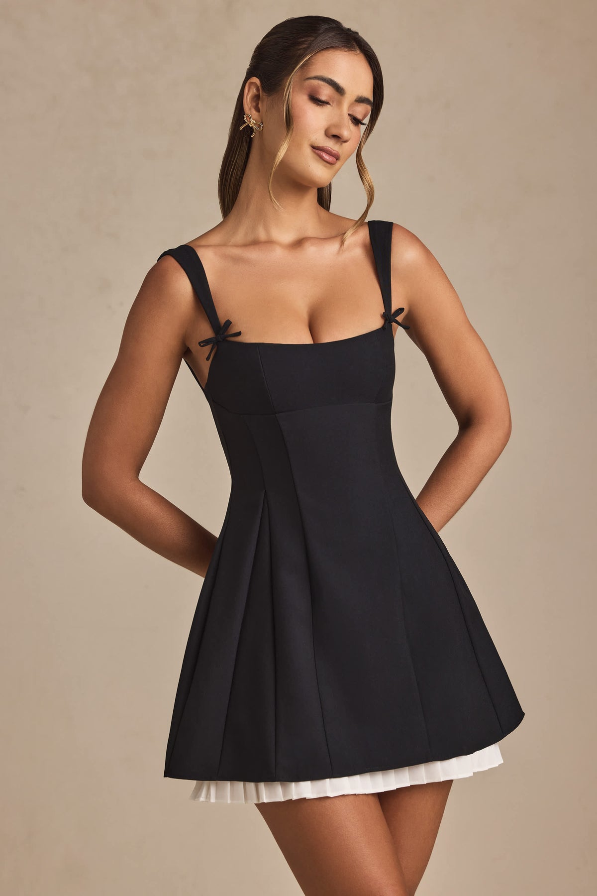 Bow-Detail Pleated A-Line Mini Dress in Black