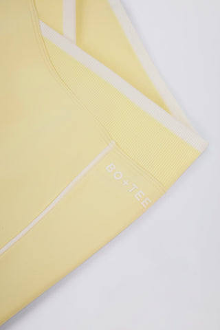 Soft Active Wrapover Contrast Mini Shorts in Soft Yellow
