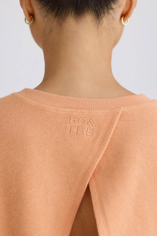 Textured Cotton Jersey Open-Back Cropped Sweatshirt in Peach