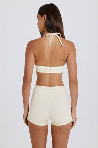 Four-Way Stretch High-Waist Mini Shorts in Cream