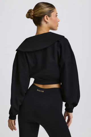 Quarter-Zip Cropped Sweatshirt in Black