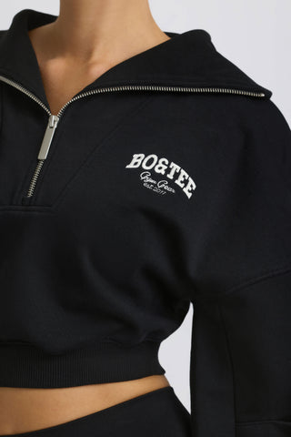 Quarter-Zip Cropped Sweatshirt in Black