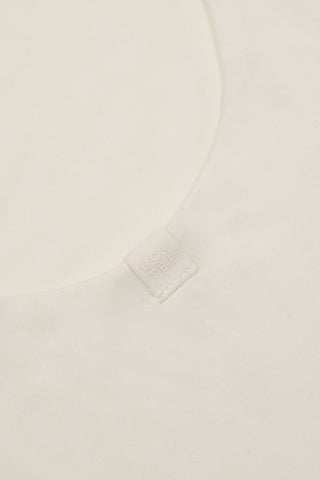 Cut-Out Bodysuit in Cream