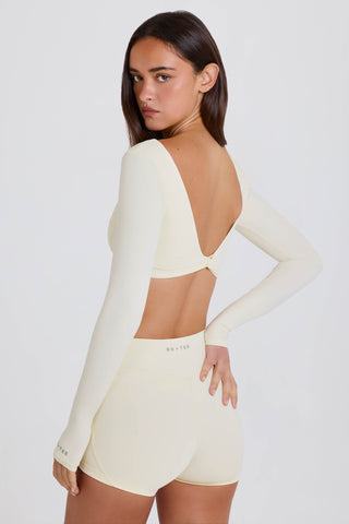 Four-Way Stretch Multiway Long-Sleeve Crop Top in Cream