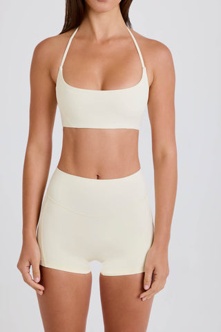 Four-Way Stretch Scoop-Neck Halterneck Sports Bra in Cream