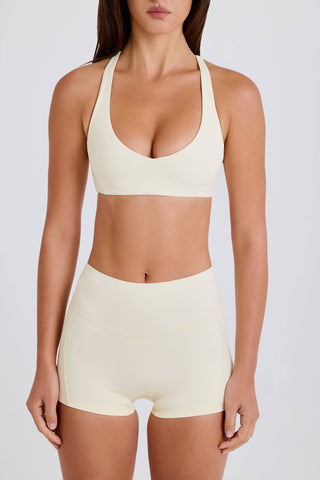 Four-Way Stretch Crossback V-Neck Sports Bra in Cream