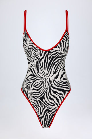Charm-Detail Cross-Back Swimsuit in Zebra Print