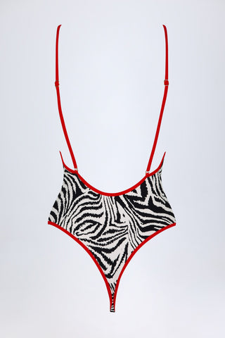 Charm-Detail Cross-Back Swimsuit in Zebra Print