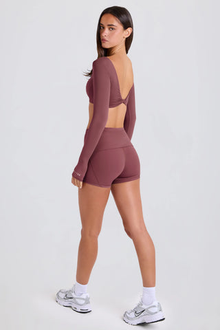 Four-Way Stretch Foldover Mid-Rise Mini Shorts in Acai